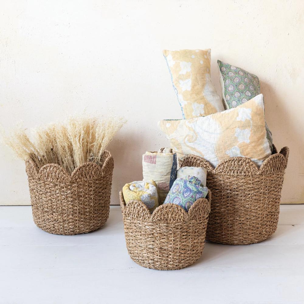 woven scalloped baskets with throw blankets 