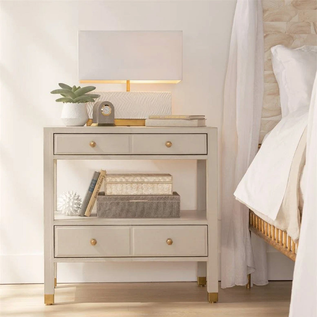 grey two drawer nightstand with white brass lamp