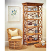 Kenian's Tortoise Shell Bamboo English Bookcase pairs with wicker chair and floral art to showcase style versatility.