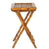 A neatly folded set of Tortoise Shell Bamboo Tray Tables with a rustic design