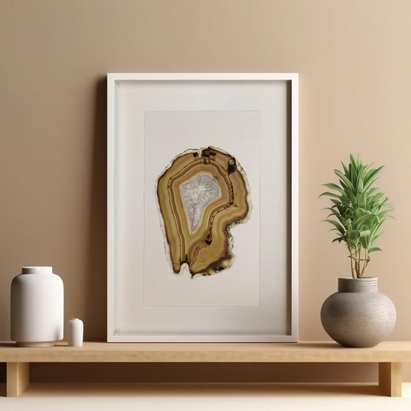 amber agate brown gem photography print on wooden shelf and neutral painted wall