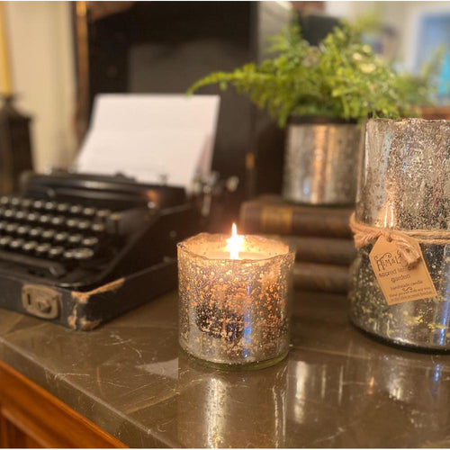 shiny silver artisan blown glass tumbler candle