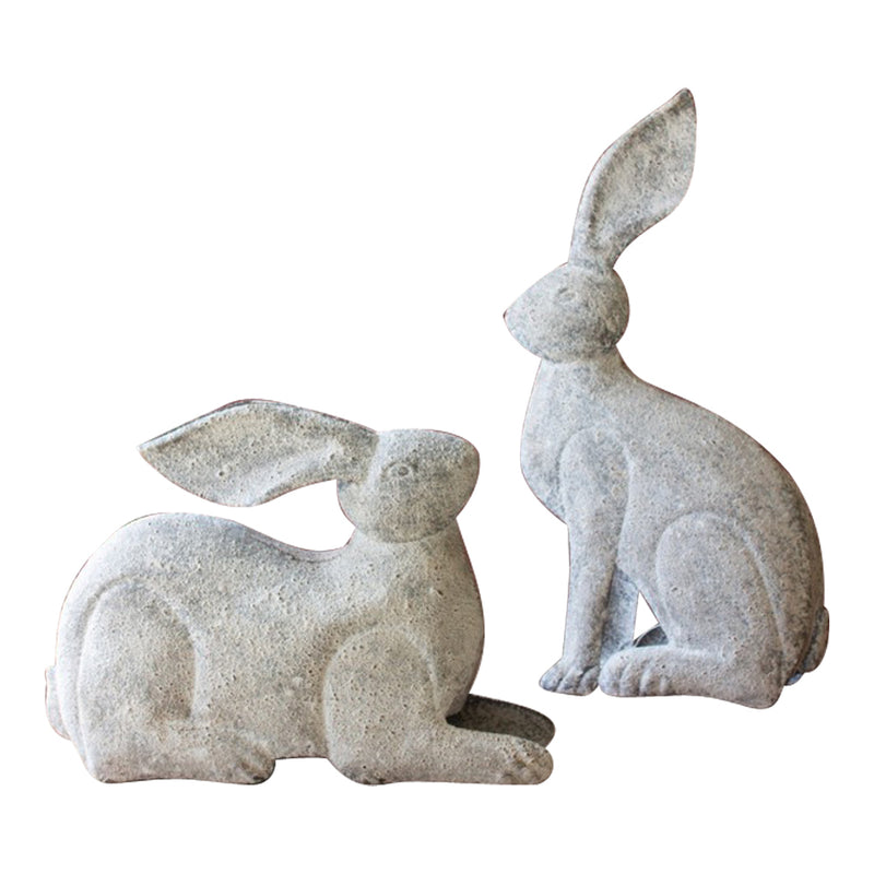 Kalalou's whimsical Rustic Metal Rabbits set on a wooden table, below a vibrant tulip picture.