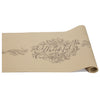 The Thankful Paper Table Runner by Hester & Cook is a charming addition to your table, showcasing the word "Thankful" in decorative script with leaf and swirl accents.