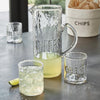 clear rippled glass cocktail glasses embossed word Cheers