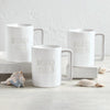 matte off white coffee mug set embossed words Beach Bum