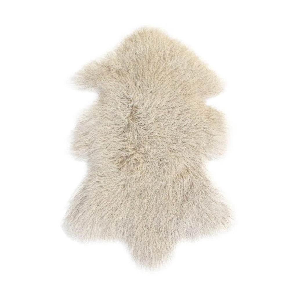 cream colored longwool sheepskin rug