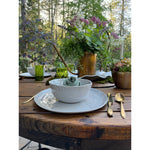 simple round melamine bowl and plate table setting