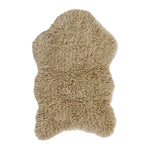 small fluffy beige pelt rug wool recycled cotton rounded edges