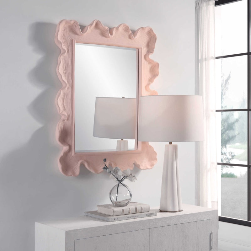 scalloped light pink-framed wall mirror organic shape waves