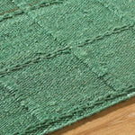 woven green jute area rug square pattern