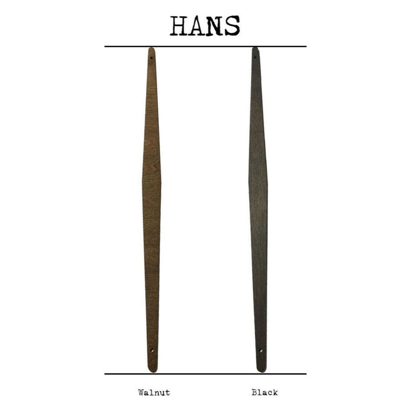 Two wooden chair legs labeled "Walnut" and "Black" under the heading "HANS," crafted with the same meticulous care as Barloga Studios' Art Print Frameless Hans Wood Hangers (available in various sizes and finishes) made in the USA.