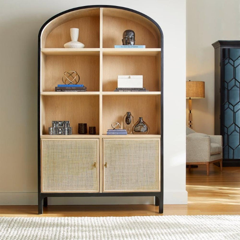 black arched wood cabinet rattan lower doors