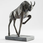 pewter finished bull sculpture on marble