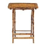 A neatly folded set of Tortoise Shell Bamboo Tray Tables with a rustic design