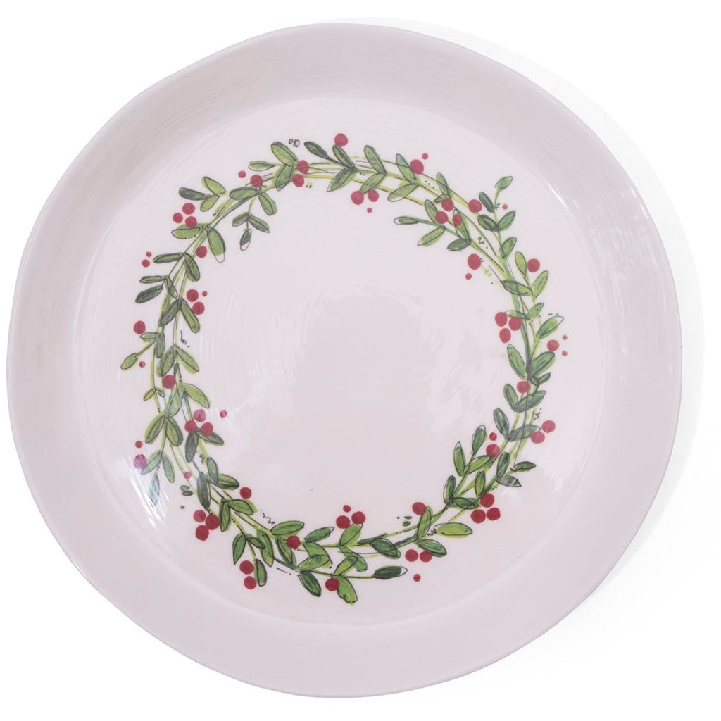 The Christmas Wreath Melamine Serving Platters (set of 2) by Always Relish feature a decorative Christmas wreath of green leaves and red berries around the rim, perfect for festive gatherings.